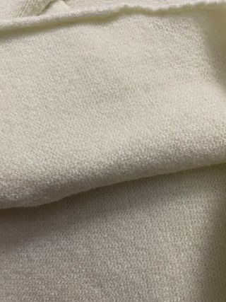 Jersey cuello alto amarillo pastel