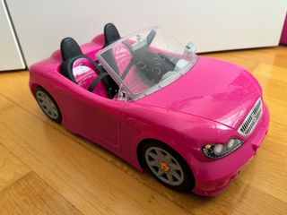 Macchina sportiva rosa + 2 Barbie