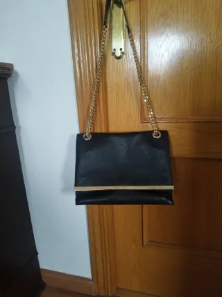 Bolso Purificación García Negro y Dorado