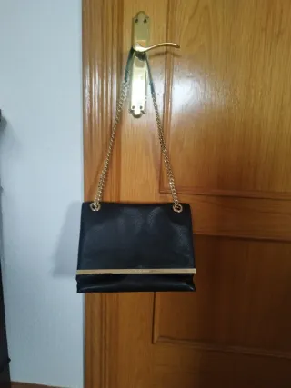Bolso Purificación García Negro y Dorado