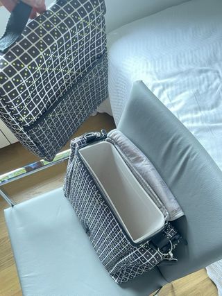 Trona de viaje portatil.