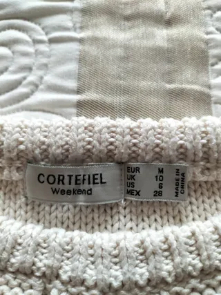 Jersey de punto beige con cremallera