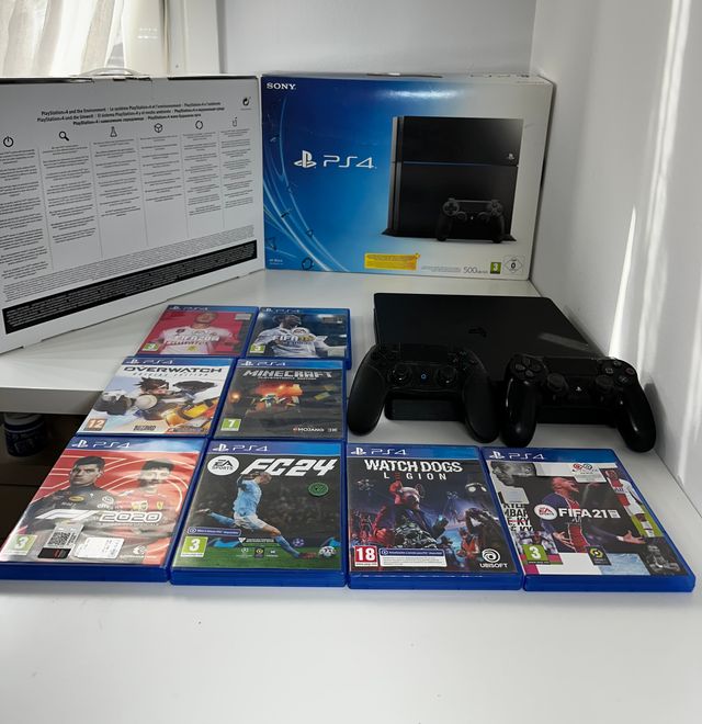 PlayStation 4 + 8 Juego + 2 Mandos
