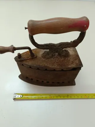 Plancha antigua de ascuas