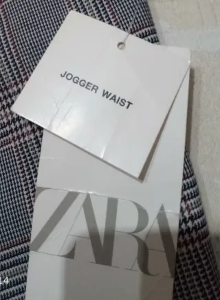 Pantaloni Zara a quadri grigi