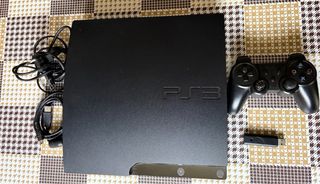 PlayStation 3 (PS3) con mando y juegos