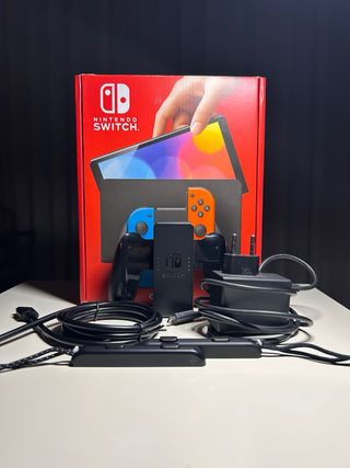 Nintendo Switch OLED Rossa e Blu - Completa