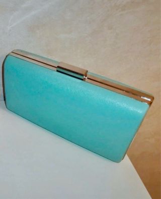 Bolso de mano color turquesa