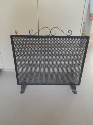 Rejilla chimenea metal negra y dorada