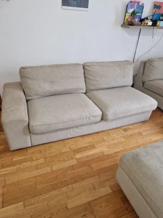 Sofá esquinero beige 3 plazas + puff