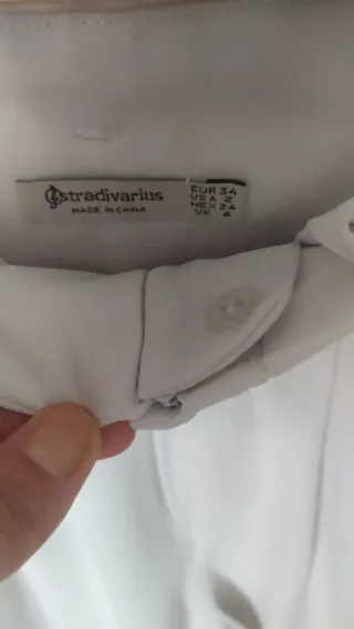 Pantalón blanco con cinturón