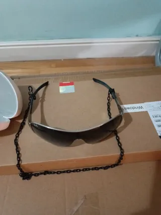 Gafas de sol Ray-Ban negras y plateadas