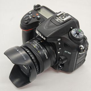 CAMARA REFLEX NIKON D7100 + OBJETIVO 50MM 1:1:8 D + CARGADOR