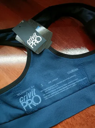 Top deportivo azul con cremallera TALLA S