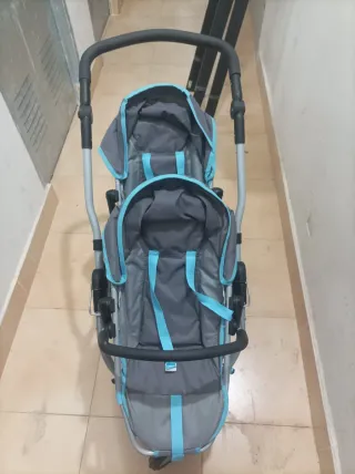 Carro gemelar para muñecos