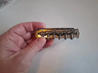 Puente Fender Jaguar Cromado