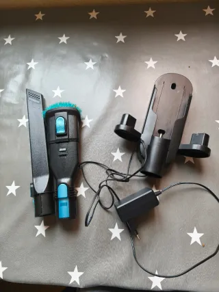 Soporte y cargador aspirador