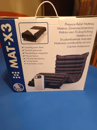 Cama articulada y colchón antiescaras