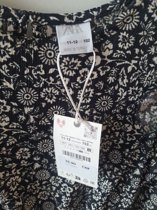 Vestido estampado con volantes Zara