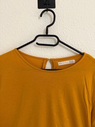 Blusa amarilla manga abullonada Sfera.