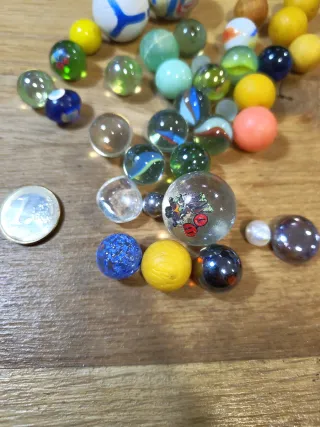 Lote de canicas y pelotas