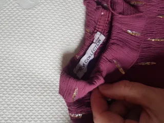 Camisa morada con detalles dorados