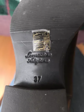 Botas altas de piel negras