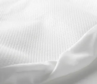 Protector de colchón cuna LENAST IKEA