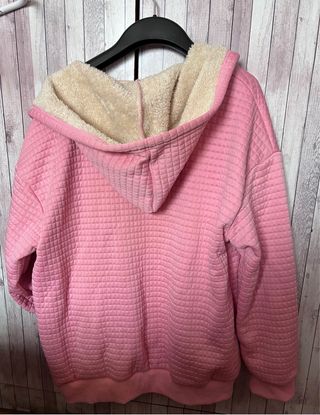 Chaqueta rosa forrada con estampado de huella