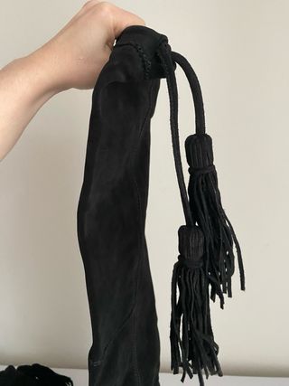 Botas altas negras con flecos