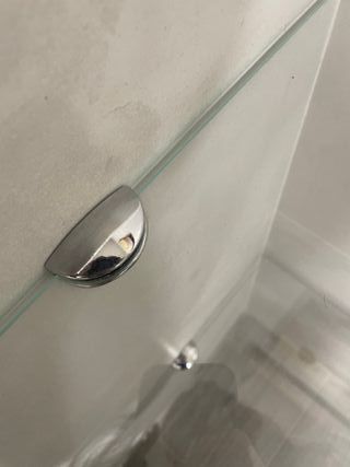 Estantería de cristal para esquina