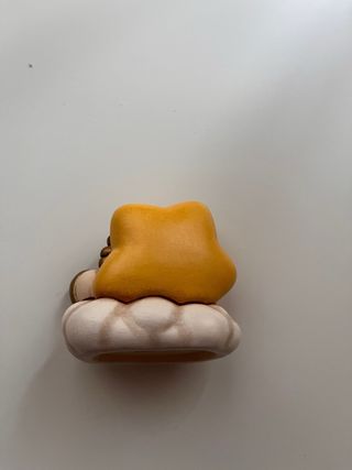 Statuina Thun angelo dormiente su stella