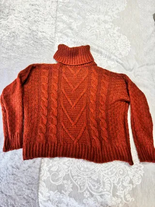 Jersey de punto naranja teja con cuello alto