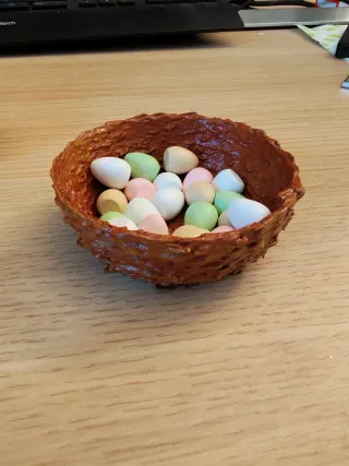 Porta risorse a forma di nido Wingspan