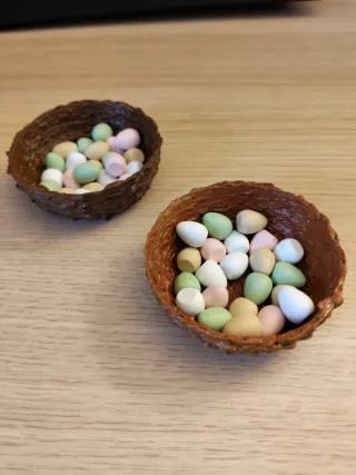 Porta risorse a forma di nido Wingspan