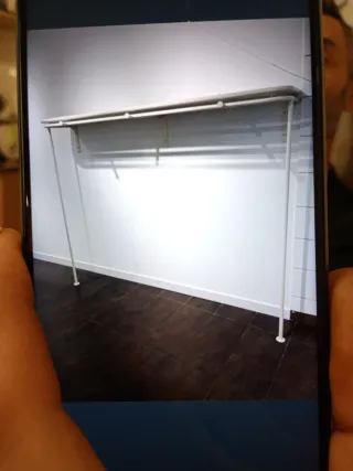 perchero organizado estantería de tienda OFERTÓN