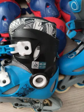 Patines en línea Oxelo con protecciones y bolsa.