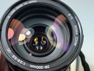 Canon 300V + Sigma 28-200mm