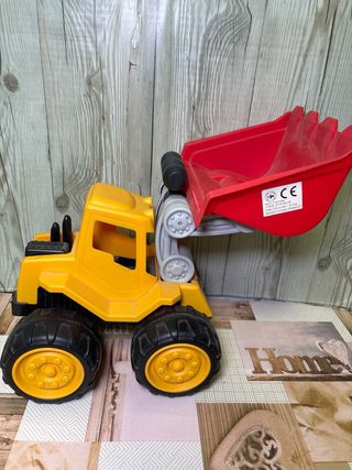 Camión excavadora de juguete amarillo