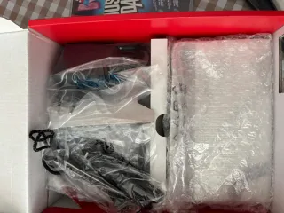 Nintendo Switch + Juegos y Accesorios