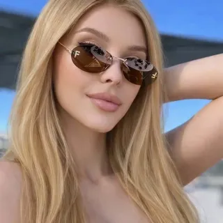 Gafas de sole marrones y doradas