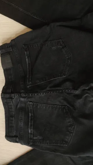 Tejanos Bershka negros talla S/36 elásticos