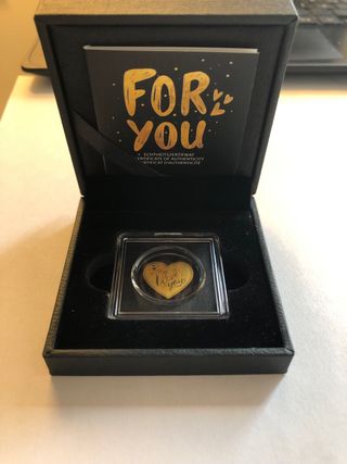 Corazón de oro con mensaje