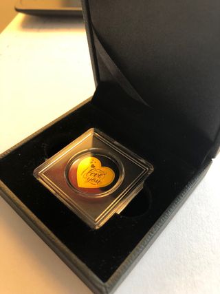 Corazón de oro con mensaje