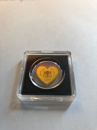 Corazón de oro con mensaje