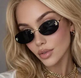 Gafas de sol ovaladas vintage minimalistas