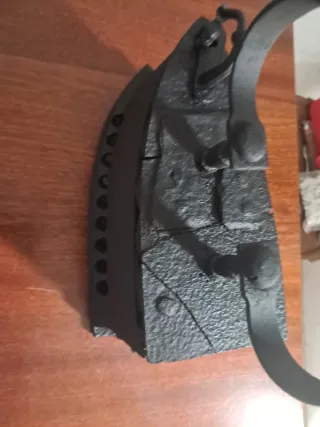 Plancha antigua de hierro fundido