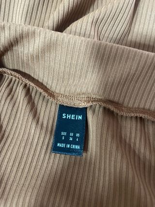 Falda larga marrón con abertura lateral