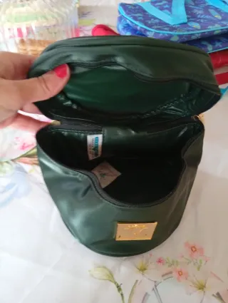 Portagioie Trus verde scuro con logo oro