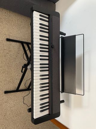 Piano digital Casio con soporte